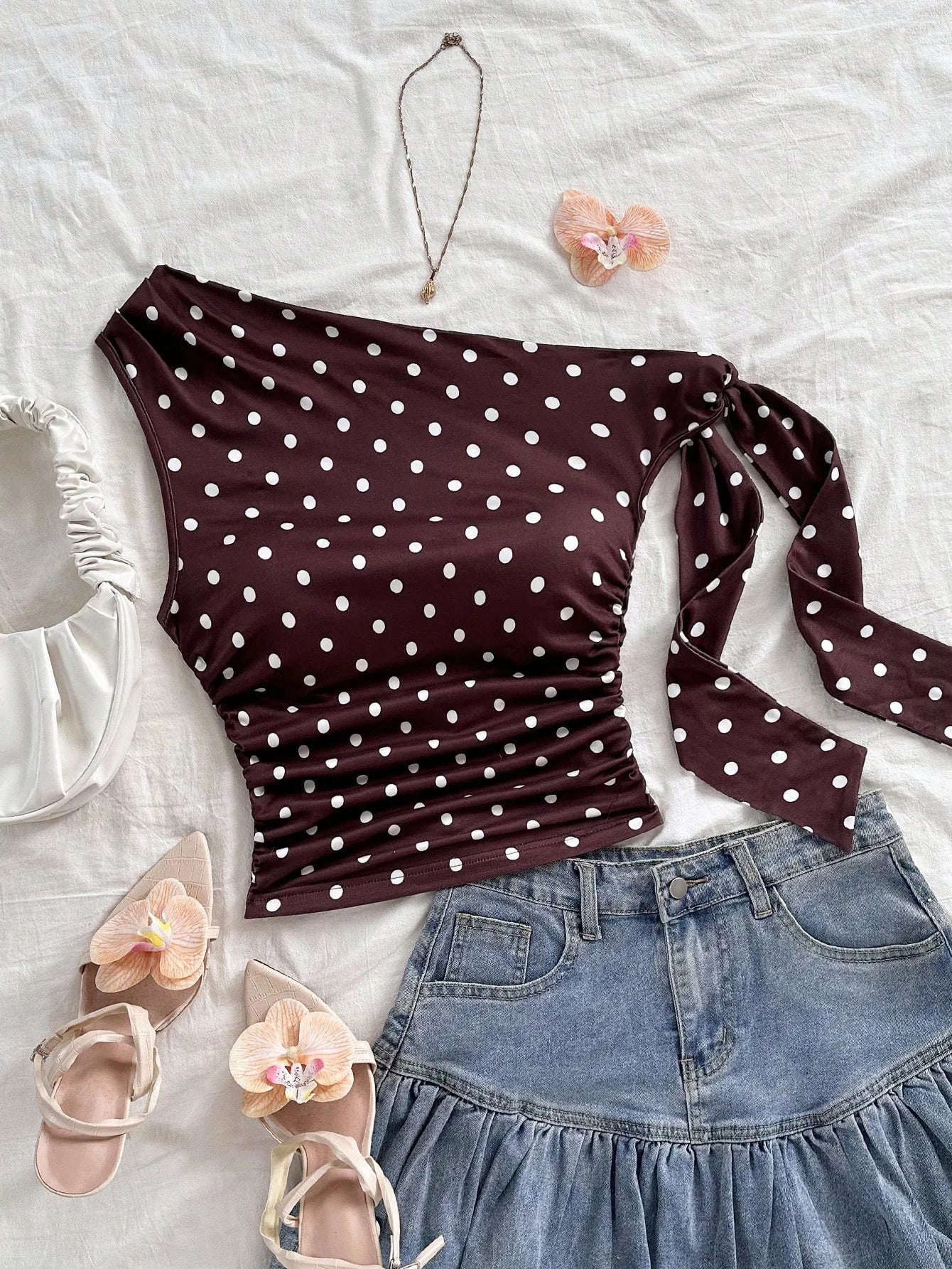 Top asymétrique à pois