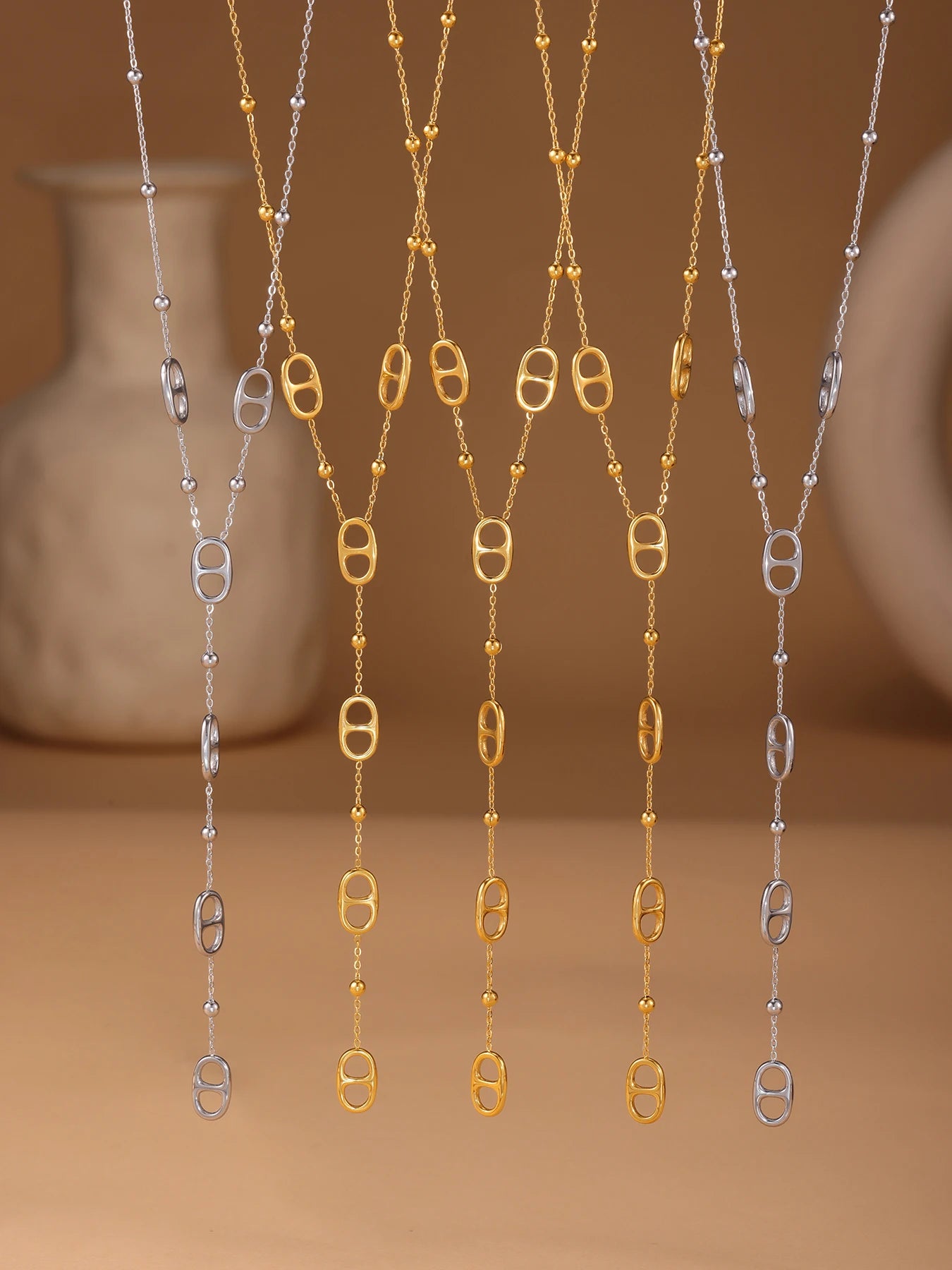 Collier long à motifs ovales