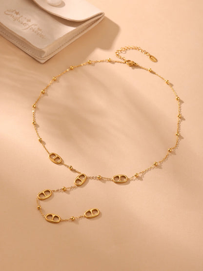 Collier long à motifs ovales
