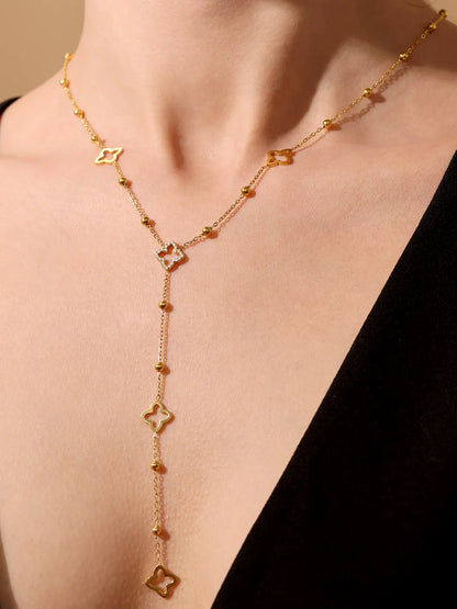 Collier long à motif trèfles