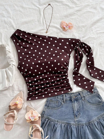 Top asymétrique à pois