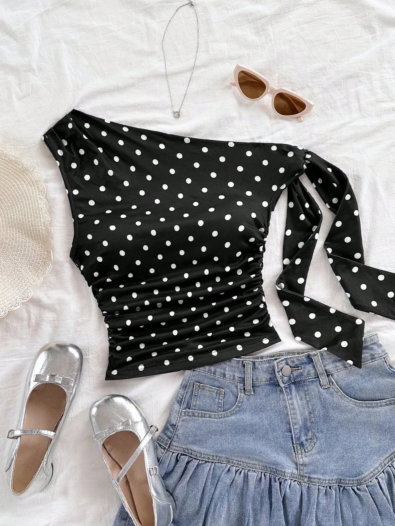 Top asymétrique à pois