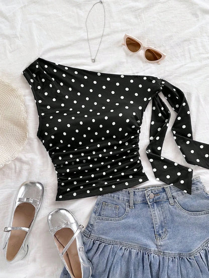 Top asymétrique à pois