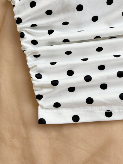 Top asymétrique à pois