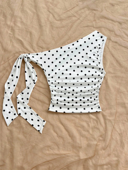 Top asymétrique à pois