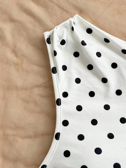 Top asymétrique à pois