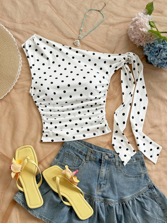 Top asymétrique à pois