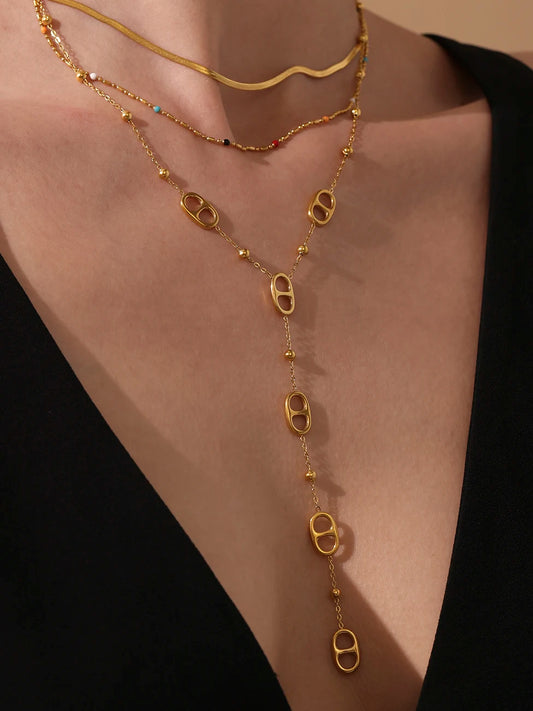Collier long à motifs ovales