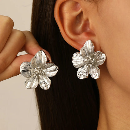 Boucles d'oreilles métalliques fleuries